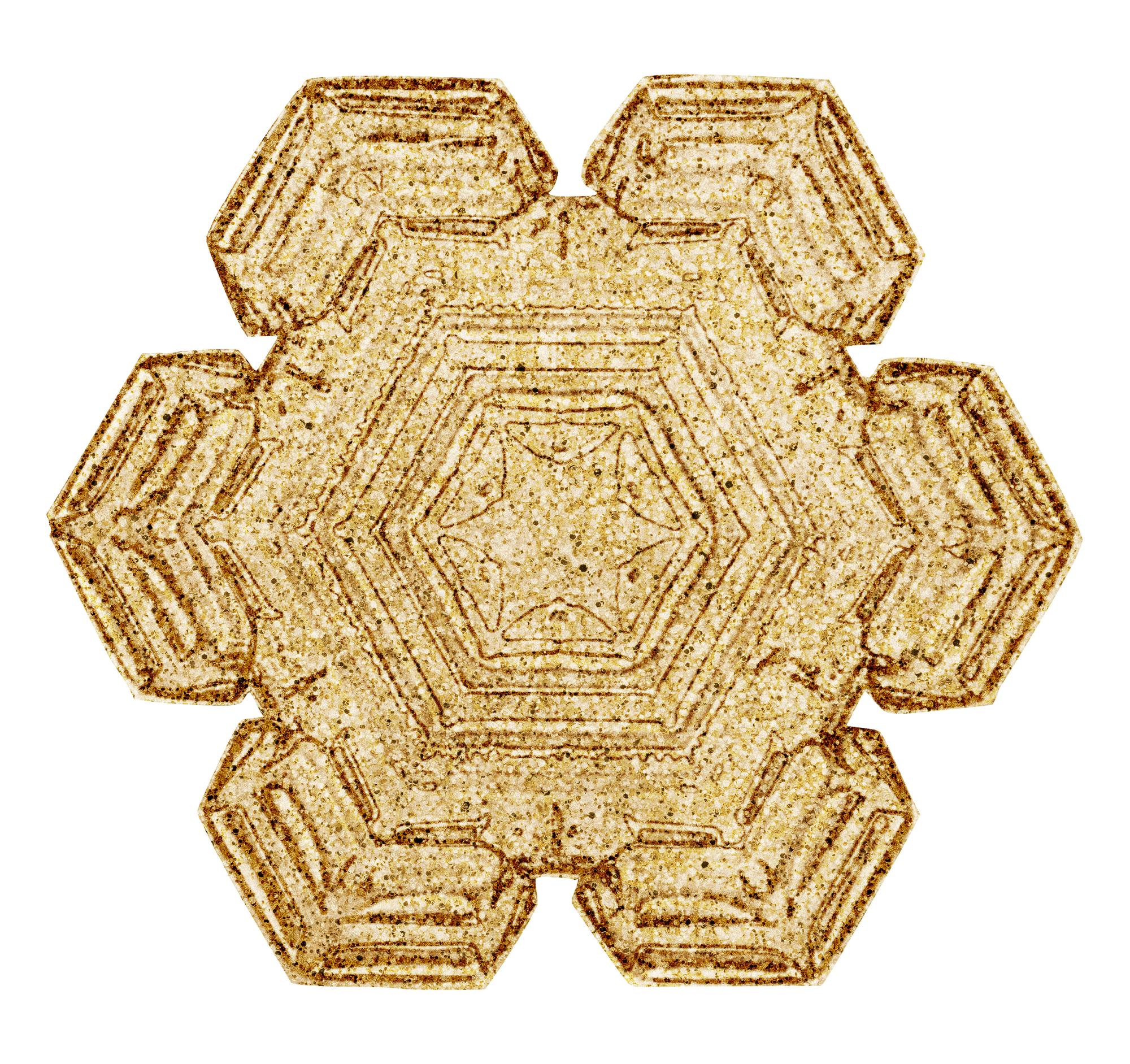 Cuscino ricamato con motivo geometrico dorato